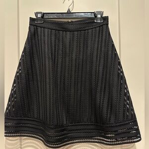 Jcrew Chic black A-line skirt with textured detailing. Size S